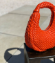 bolso trenzado v14 mandarina