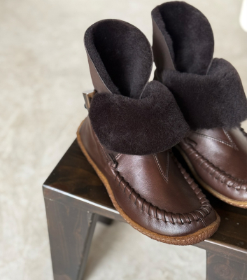 lined slip-on boots origin...